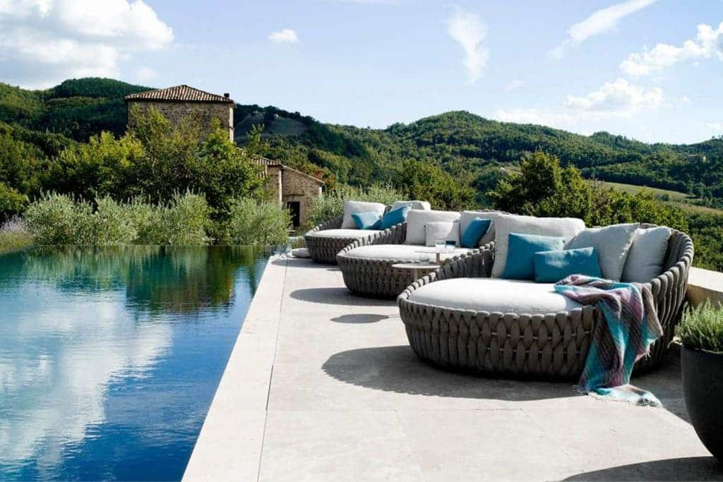 Embrace Relaxation with Daybeds by the Water Comfy Pool Furniture Ideas