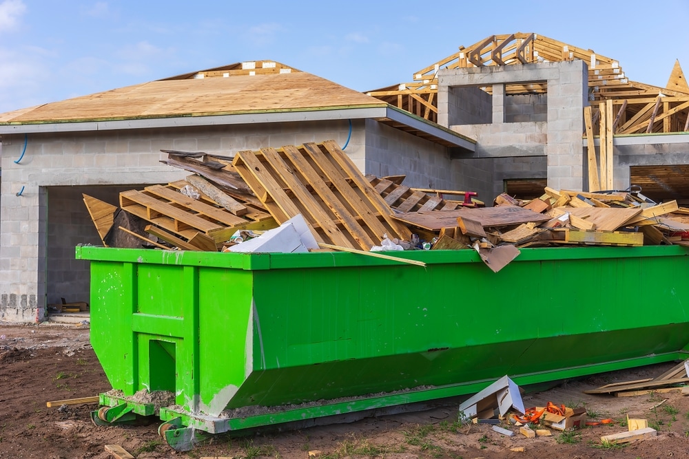 Dumpster Full Of Wooden Pallets Boards And Other Waste On