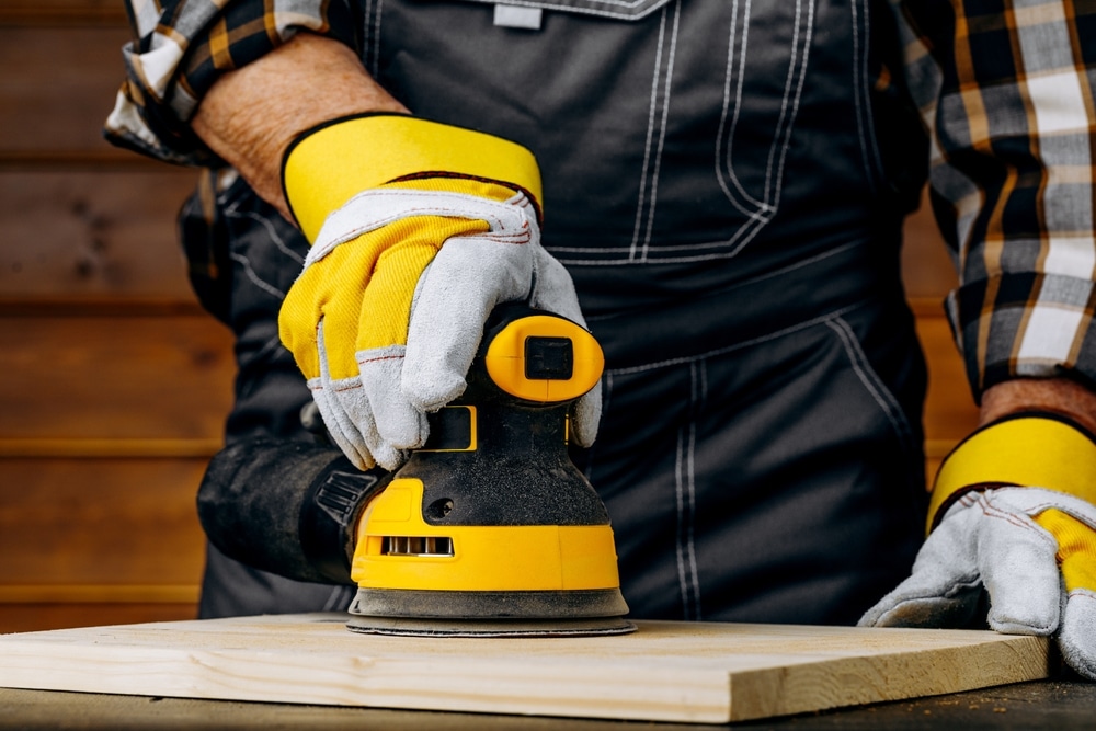 Close Up Of Sending A Wood With Orbital Sander At