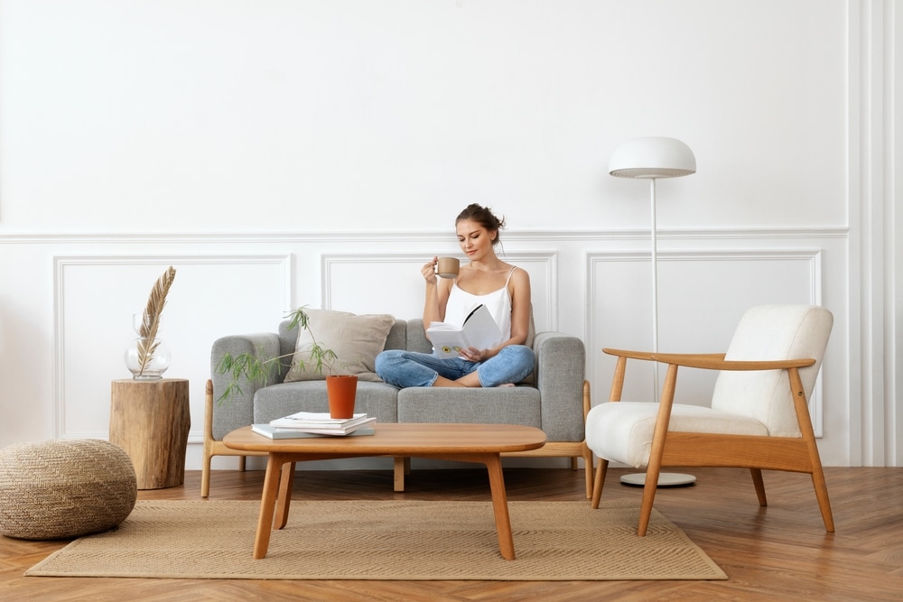 Woman Relaxing In A Minimal Home