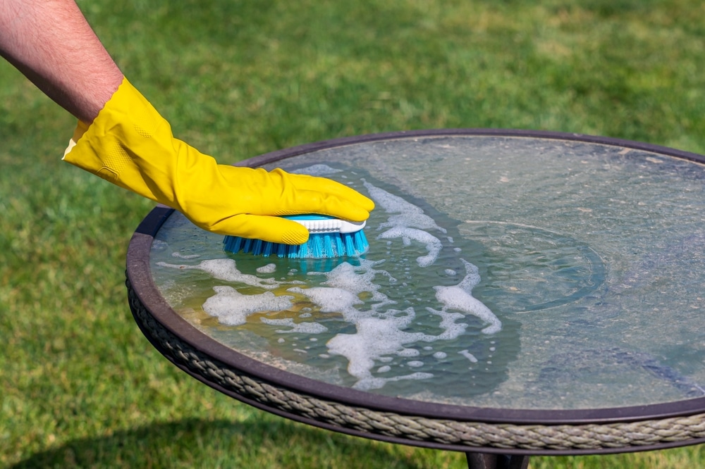 Cleaning Patio Furniture By Hand With Brush Spring Cleaning Household