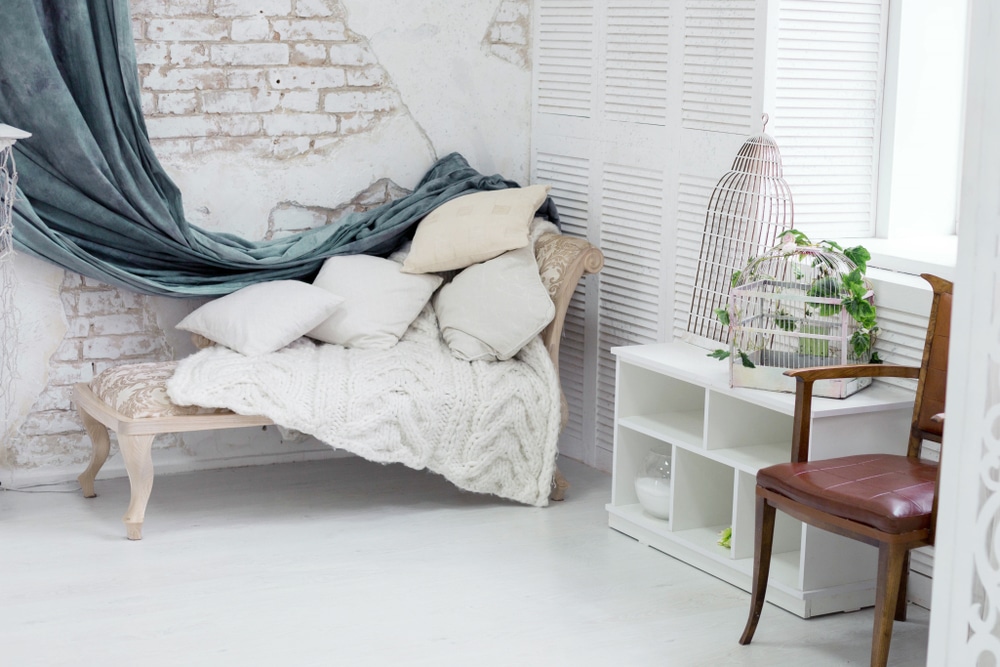 Daybed With Cushions In A Corner Of The Room With