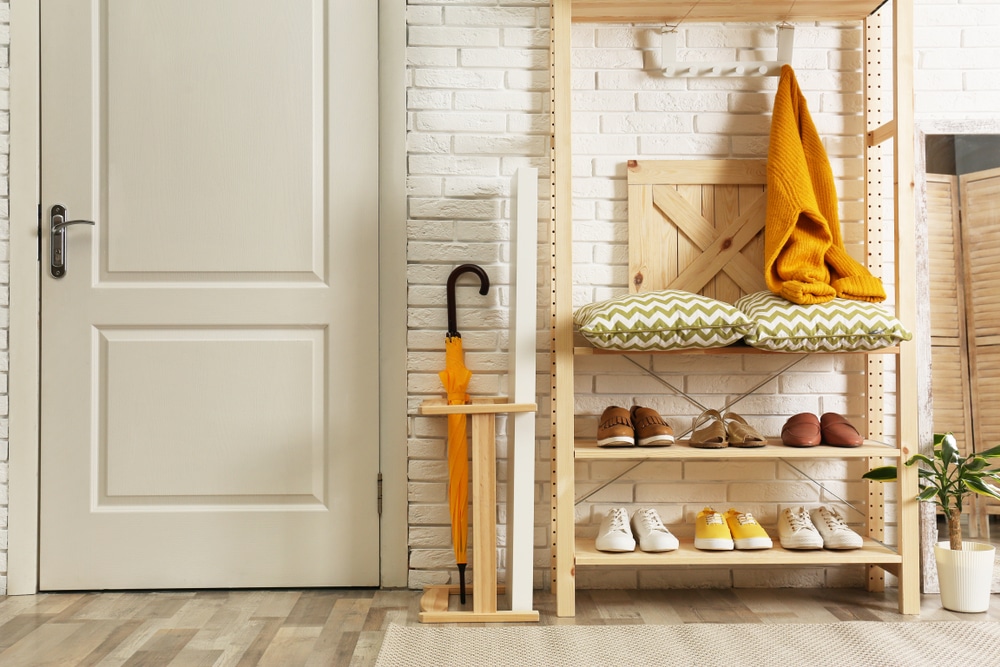 hallway interior with wooden shelving unit