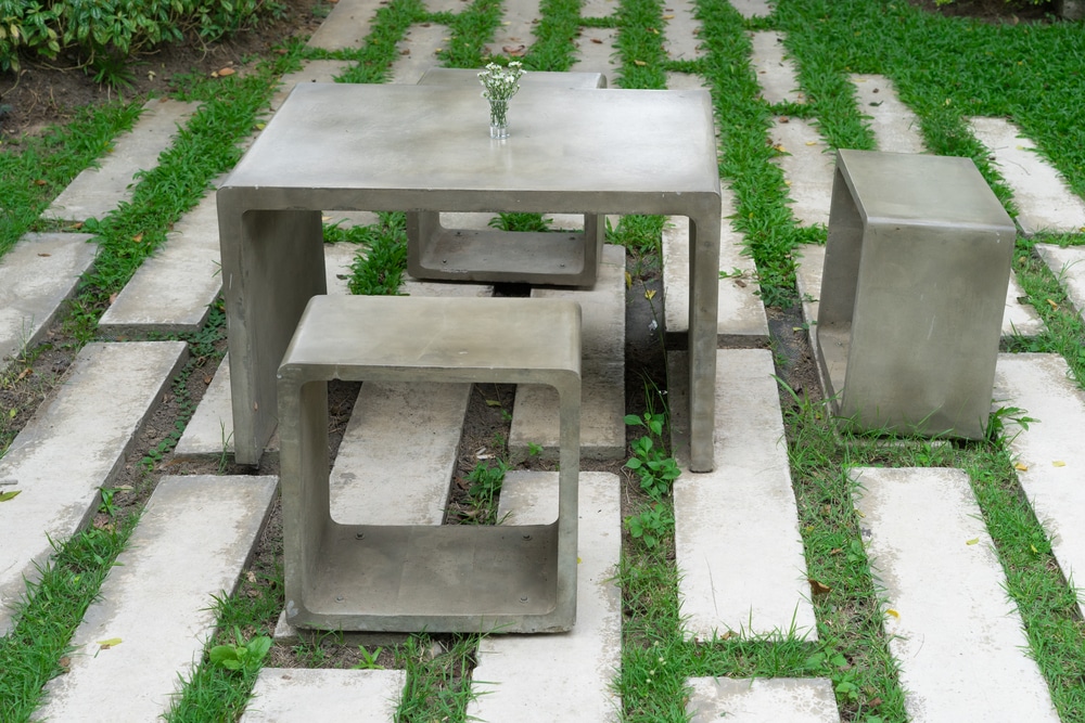 Concrete Table And Chair In Garden exterior Decoration background